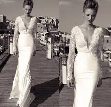 Long sleeve dresses are ideal for cold season weddings because you feel cozier in them plus such a dress is timeless, and you can also go for a church ceremony in a long sheath white lace wedding dress makes you look like a snow queen. Tight Long Sleeved Lace Wedding Dress I Think This Would Fit My Body Nicely Tight Wedding Dress Long Sleeve Wedding Dress Lace Wedding Dresses Tight Fitted