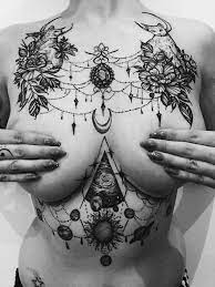 Black Work Sternum And Chest Tattoos Tattoos Chest Tattoo Designs Female Chest Piece Tattoos