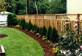 If Your House Is One Of The Many With A Perimeter Fence You Have A Variety Of Landscaping Options To Add Inte Backyard Fences Backyard Landscaping Along Fence