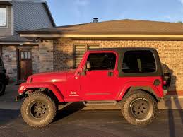 Image result for Flame Red 2005 Jeep