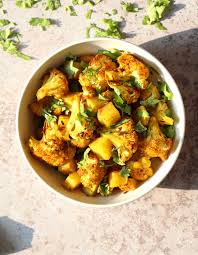 Baked Aloo Gobi Vegan Recipe Indian Spiced Potato Cauliflower Vegan Richa Recipe Indian Food Recipes Aloo Gobi Recipes