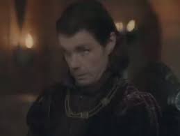 "the camera pinning to aemond when larys says harrenhal will drive daemon  to madness foreshadowing aemond’s arc. oh we’re so not ready" (Cr to:  @aemondment (twitter/x))