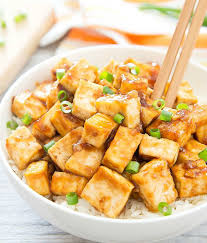 Tofu Is Baked Until Crispy And Then Tossed In A Thick Chinese Style Stir Fry Garlic Sauce I M Pretty Excited A Tofu Recipes Healthy Tofu Dishes Tofu Recipes