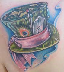 17 mad and mischievous cheshire cats tattoos. Alice In Wonderland Mad Hatter Hat Tattoo By Johnny Smith Mad Hatter Tattoo Wonderland Tattoo Disney Tattoos
