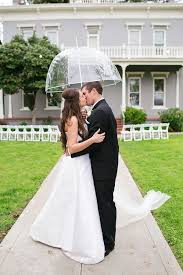 Bride And Groom Kissing Under Clear Wedding Umbrella Umbrella Wedding Rain On Wedding Day Bridal Umbrella