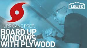 † drill holes with the appropriate size and type of bit for the anchors. How To Board Up Windows With Plywood Hurricane Prep Youtube