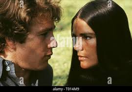 LOVE STORY Ali MacGraw and Ryan O'Neal in the 1970 Paramount film Stock  Photo