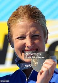 Silver medal winner Ginger Huber of USA celebrates