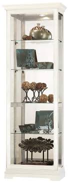 Maybe you would like to learn more about one of these? Amazon Com Howard Miller Brantley Iv Curio Cabinet 680 674 Aged Linen Finish Vertical Home Decor Four Glass Shelves Five Level Display Case No Reach Light Sliding Doors Furniture Decor