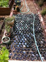 Pin By Alane Rimmelspacher Chenault On Outside Wine Bottle Garden Bottle Garden Recycled Wine Bottles