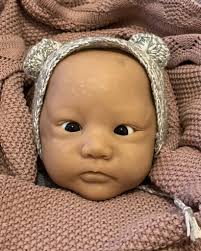 Newborn smush Olive painted by Elaine Colbert of ElliesBabies. Haven't seen  too many Olives done as a little boy and I'm loving this one. Photos by Elaine  Colbert.