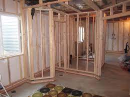 How to frame a wall that has a doorway in it. Before And After Pictures Finishing A Basement Bedroom