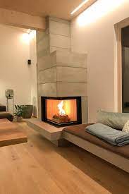 systemkamin als eckvariante mit sitzbank kamin wohnzimmer kamin kamin modern