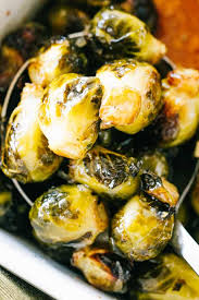 When cooked improperly, these little morsels can leave a bitter and sulfuric taste in your mouth, but when you roast them, we promise you'll be a lifelong fan. Oven Roasted Brussels Sprouts With Honey Balsamic Glaze Crispy Flavorful Oven Roaste Brussel Sprout Recipes Roasted Roasted Brussel Sprouts Brussel Sprouts