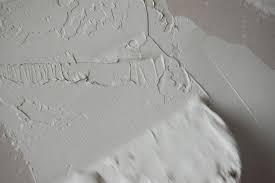 Drywall 101 Using Joint Compount For A Stucco Wall Finish Stucco Walls Textured Walls Diy Plaster