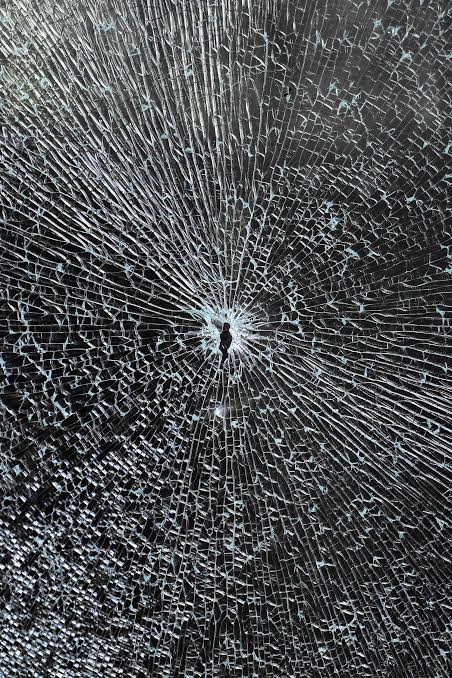Shattered glass with a small hole in center - Free Photo on Unsplash