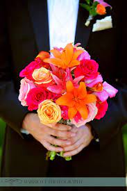 What kind of flowers are orange and pink? Pin By Villa Siena On Bridal Bouquets Boutonnieres Yellow Bridal Bouquets Pink Wedding Flowers Wedding Bouquets