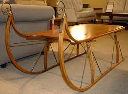 Braided iron details and open log designs are just a few of the options we offer you in rustic coffee tables to match any style of cottage furniture and lodge décor you can brew up. Sleigh Coffee Table Brices Furniture