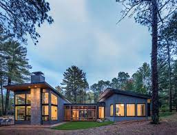 Lake house plans & waterfront cottage style house plans. Modern Lake House Getaway On Forested Landscape In Northern Minnesota