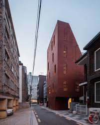 Five Story House Stpmj Archello Brick Facade Brick Architecture Red Brick House