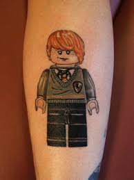 32 Lego Tattoos That Will Thrill Your Inner Child Lego Tattoo Harry Potter Tattoos Ron Weasley Tattoo