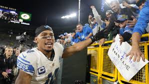 A Packers fan poured beer on Detroit Lions WR Amon-Ra St. Brown