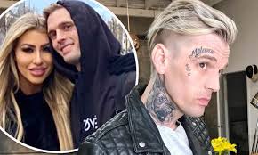 Aaron Carter reveals NEW face tattoo with his girlfriend's name... after  sparking engagement rumors
