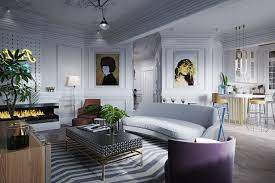 Soggiorno Arredato Con Un Divano Di Colore Grigio Chiaro E Tavolino Nero Cucina A Vista Con Isola Stili Di Casa Casa Moderna Idee Di Interior Design