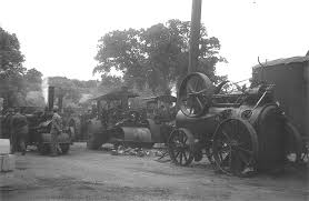 General view of Lamberts yard showing a portable and road rollers