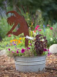 Other garden decorations diy style for you includes the wire and stone heart decoration. Garden Art Anyone Can Create Midwest Living