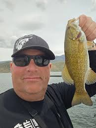 Thursday was beautiful day and a good day for fishing I had four bass this  big one here I had to take a picture before releasing her this is my first  big