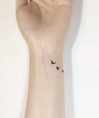 Awesome small bird tattoo design on wrist tattooimages biz. Bird Tattoo Bird Tattoo Wrist Tattoos Small Wrist Tattoos