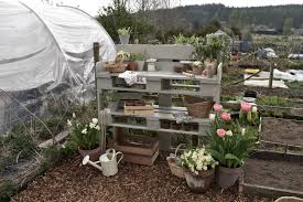 A pop of color can be added to the benches and layered with gorgeous cushions and throws for some cuddling up when the chill just begins to set. Upcycled Pallet Diy Potting Table Hollie Berries