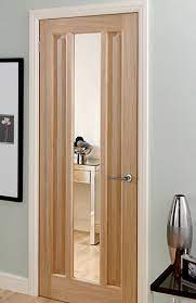 Clear flat fire rated glass. Kilburn Oak Pre Glazed Interior Door