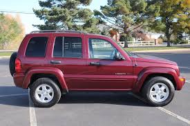 Image result for Flame Red 2003 Jeep