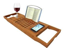 The pristine bamboo bathtub caddy tray is one of the best bathtub trays for reading as it comes with a removable book cover which fits most books well. Bathtub Caddy Bamboo Bathtub With Extending Sides Reading Rack Tablet Holder Cellphone Tray And Wine Glass Holder Buy Online In Bahamas At Bahamas Desertcart Com Productid 25127107