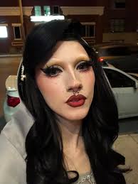 MEET THE TEAM Hey guys!! My name is Karma K Meleon and I've been doing drag  for about 2 years now! As a transgender woman and drag artist i handcraft  every aspect