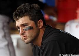 Braves' Uggla gladly changes jersey number