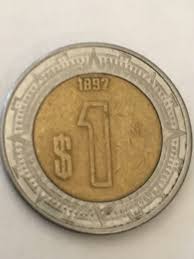 50 centavos coins are minted over the punched out cores of the rings used to make the 5 peso coins (km#605), which was the main reason for the change in size and material (to use the cores instead of remelting them). New Member With Interesting Coins 1997 1 Estados Unidos Mexicanos Coin Community Forum