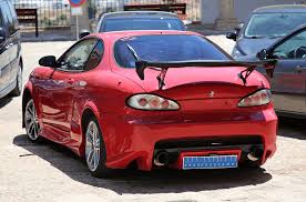 Image result for Wildberry Red 1999 Tiburon