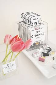 Boost your branding with water bottle labels. Love The Coco Chanel Party Favors Hershey S Nuggets Wraps Lovely Inside The Chanel Perfume Label Vase Coco Chanel Party Chanel Party Chanel Birthday Party