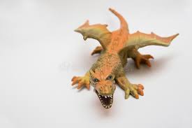 Scarica tutte le foto e usale anche per progetti commerciali. Drago Arancio Del Giocattolo Fotografia Stock Immagine Di Oggetto Nero 70055836