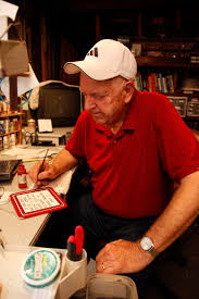 Artist gives away handmade signs