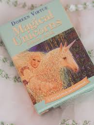 Cups, swords, rods, pentacles court cards: Magical Unicorns Oracle Cards By Doreen Virtue Georgie Xoxo