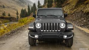 2018 jeep wrangler sahara with 7″ skyjacker suspension lift (installed by jw motorsports), sitting on tis 544mb 24×14 wheels, wrapped in nitto tires 38 x 13.5 24 (installed by he motorsports). 2018 Jeep Wrangler Caricos