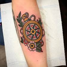 Traditional Compass And Flower Tattoo On The Forearm Traditional Compass Tattoo Traditional Nautical Tattoo Sleeve Tattoos For Women