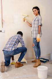 Maybe you would like to learn more about one of these? Young Couple Painting Walls Together During Renovation Of Home Free Stock Photo And Image