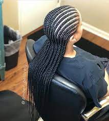 The top of this blonde hair is pulled back into a bun with one side styled into a fishtail braid. Pin By Nicole On Hair Braids For Black Hair Braided Hairstyles Braided Hairstyles Updo