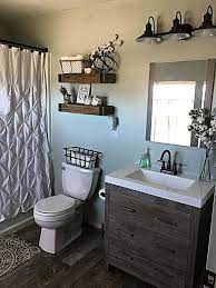 Use this small bathroom decorating idea to display accessories and artwork or stash small toiletries, toilet paper, and cosmetics. 27 Farmhouse Small Bathroom Design Bathroom Makeovers On A Budget Small Bathroom Decor Budget Home Decorating