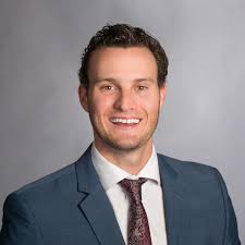 Alex Maloney, Real Estate Agent